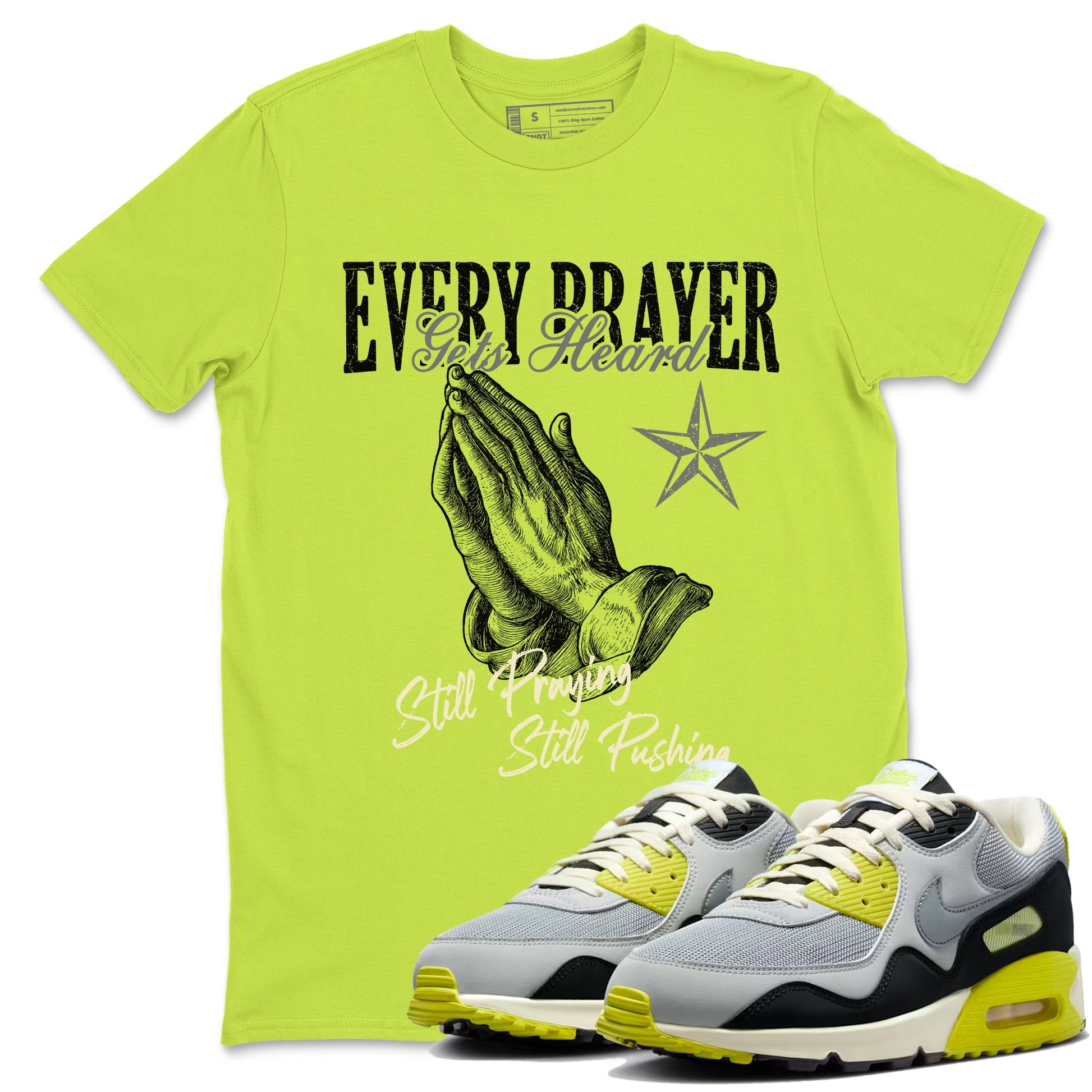 Every Prayer Gets Heard sneaker match t-shirt styled to complete your fit with the Air Max 90 Cyber sneakers, shown in Safety Green 1.