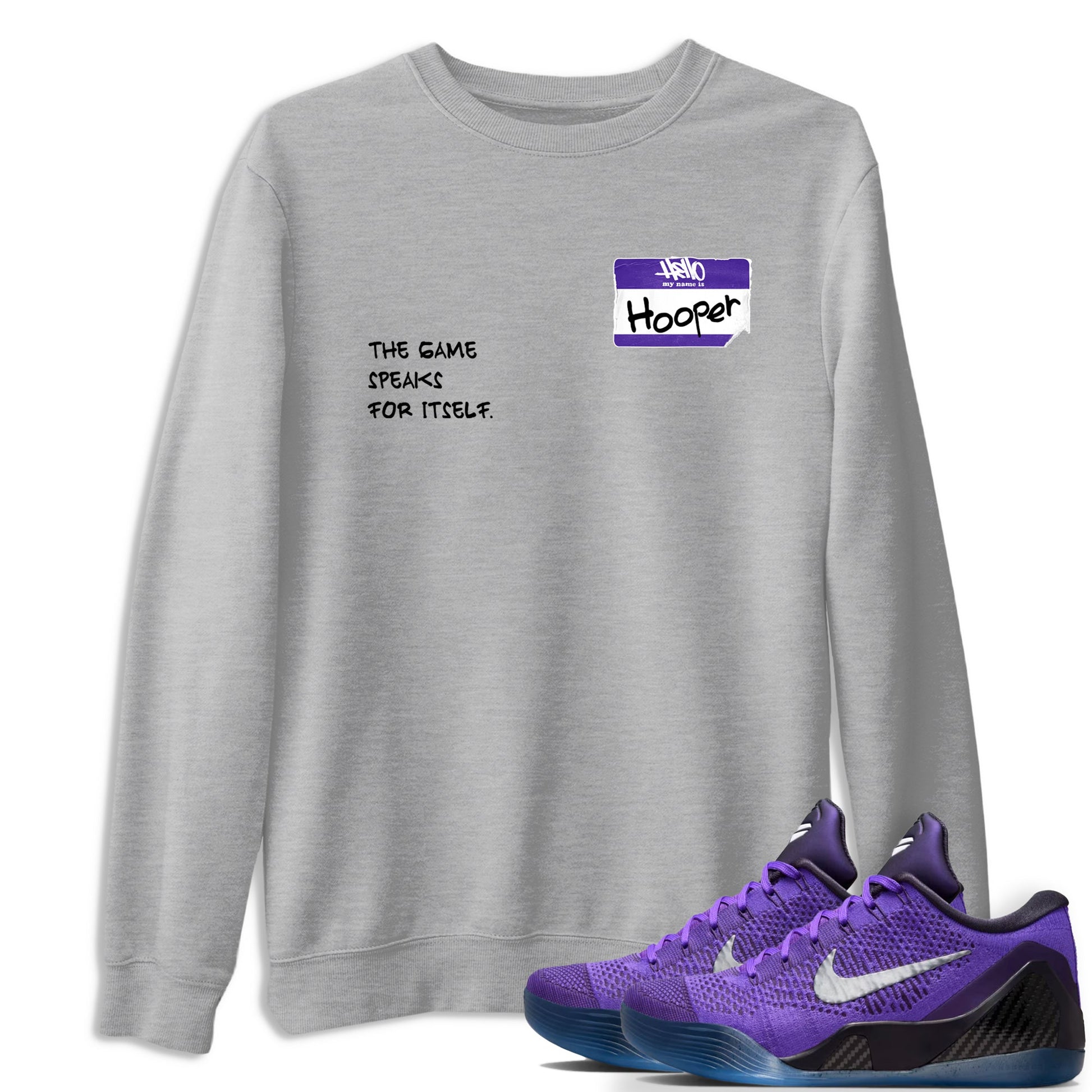 Sneaker Threads – Sneaker Tees To Match Nike KB 9 Hyper Grape – Hooper Badge Graphic Tee Heather Grey 1. Perfect for Jordan releases 2025 colorways. Perfect for purple basketball sneaker releases and legacy-inspired colorways for 2025 hoopers.