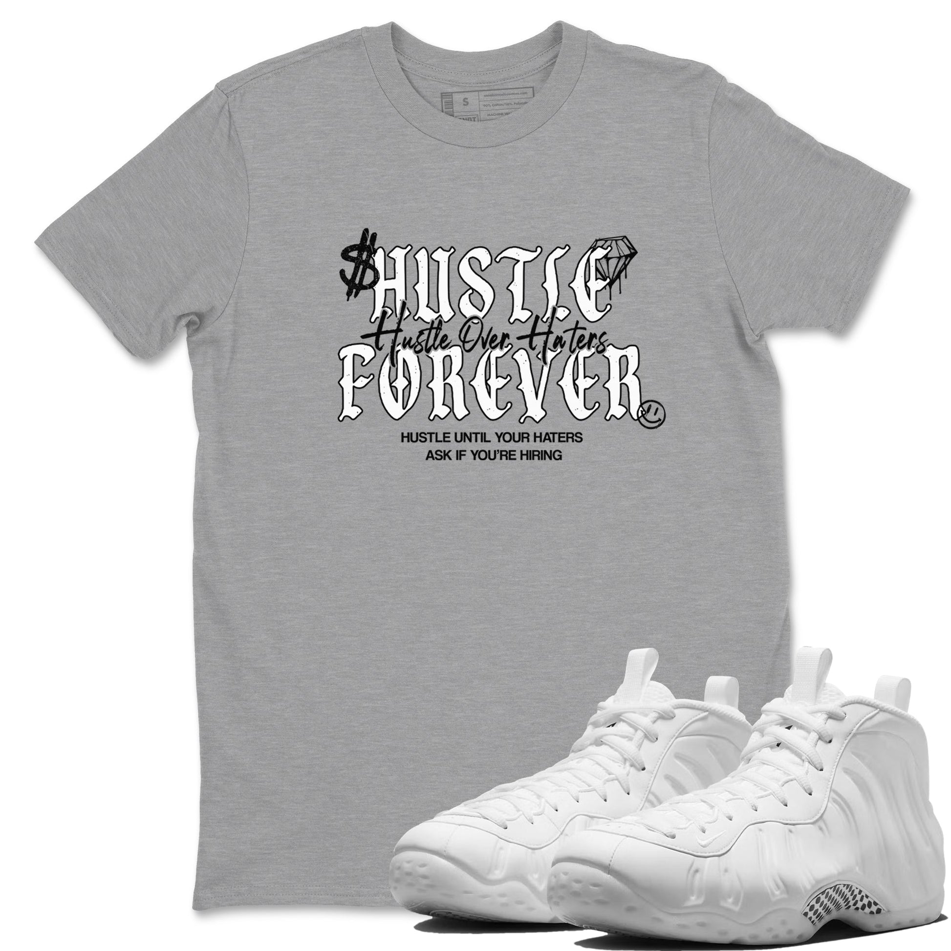Hustle Over Haters sneaker match t-shirt styled to complete your fit with the Air Foamposite One Triple White sneakers, shown in Heather Grey 1.
