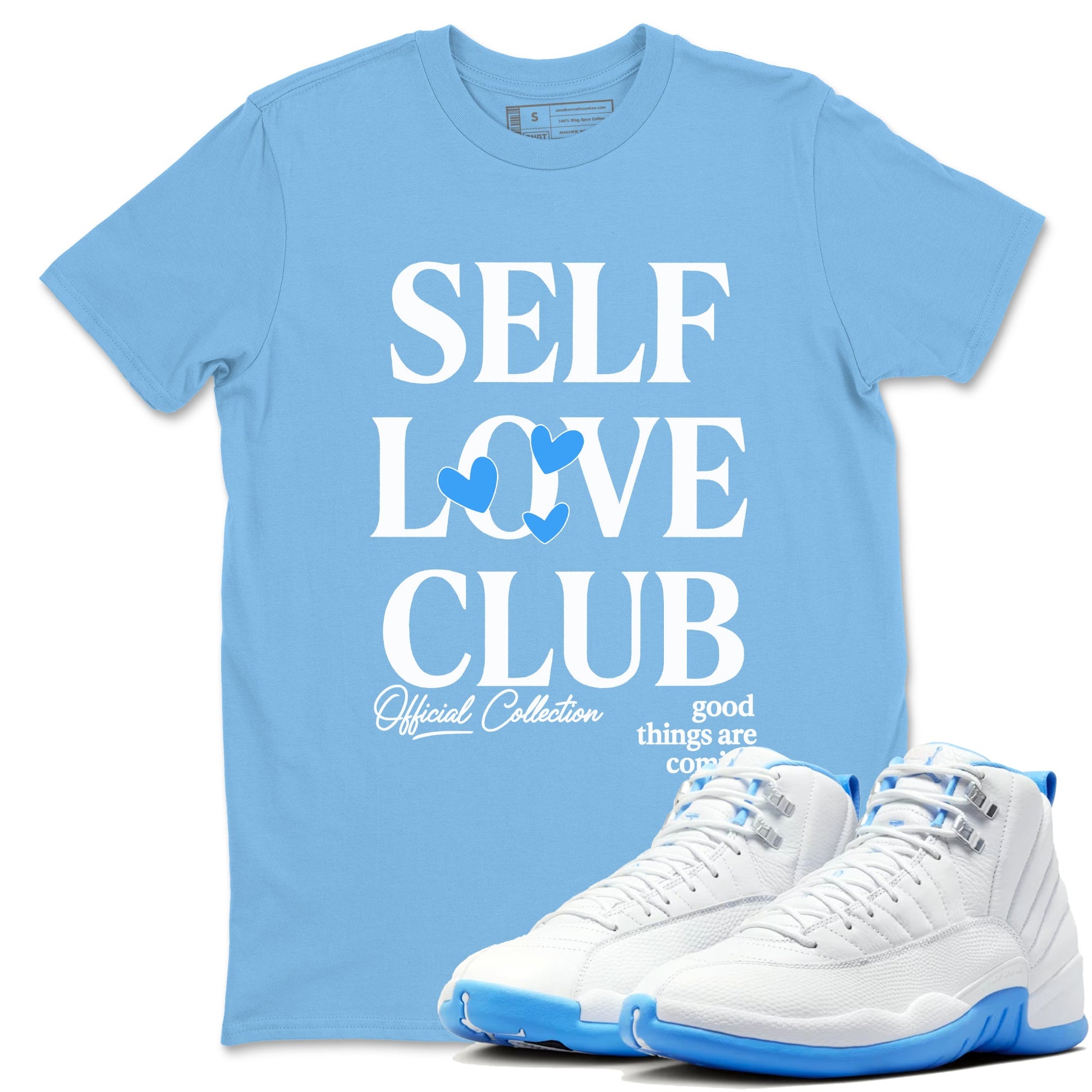 Self Love Club sneaker match t-shirt styled to complete your fit with the Air Jordan 12 White and University Blue sneakers, shown in Carolina Blue 1.