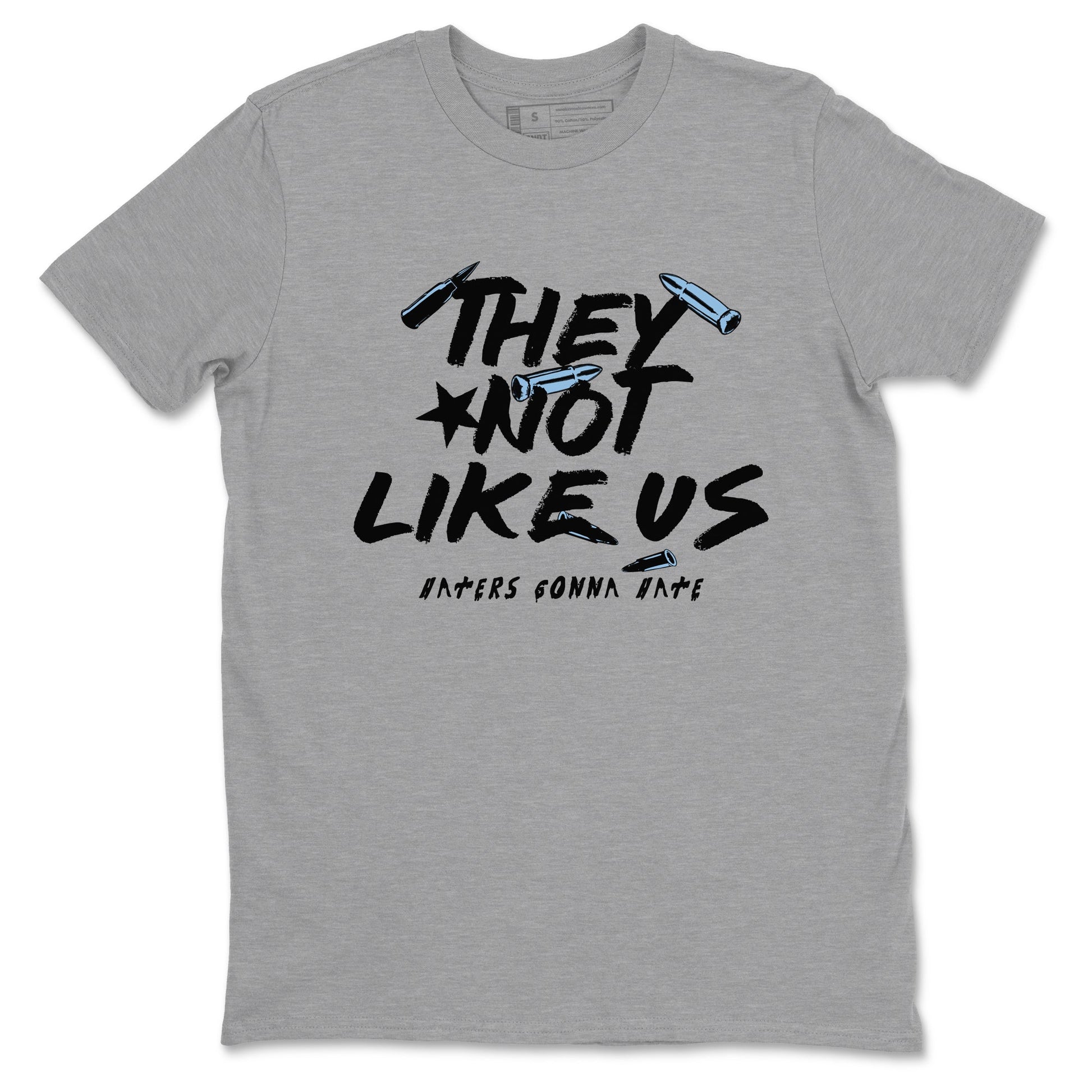They Not Like Us sneaker match t-shirt styled to complete your fit with the Air Foamposite One Psychic Blue sneakers, shown in Heather Grey 2.