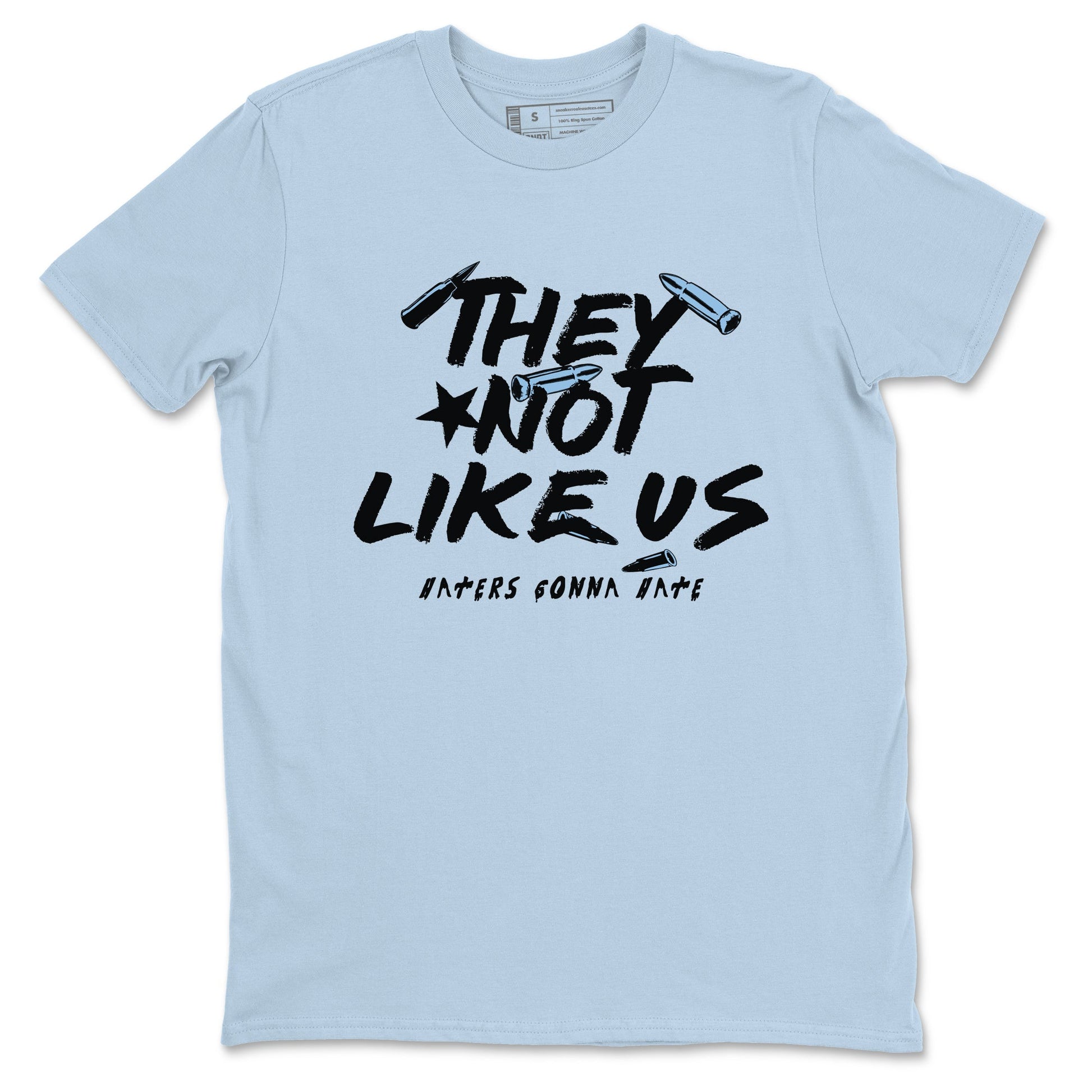 They Not Like Us sneaker match t-shirt styled to complete your fit with the Air Foamposite One Psychic Blue sneakers, shown in Light Blue 2.