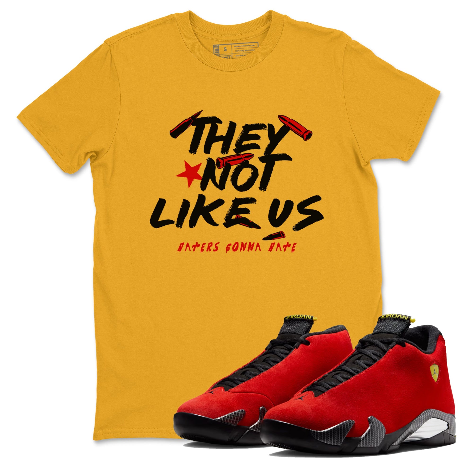 They Not Like Us sneaker match t-shirt styled to complete your fit with the Air Jordan 14 Challenge Red sneakers, AJ14 Ferrari, shown in Gold 1.