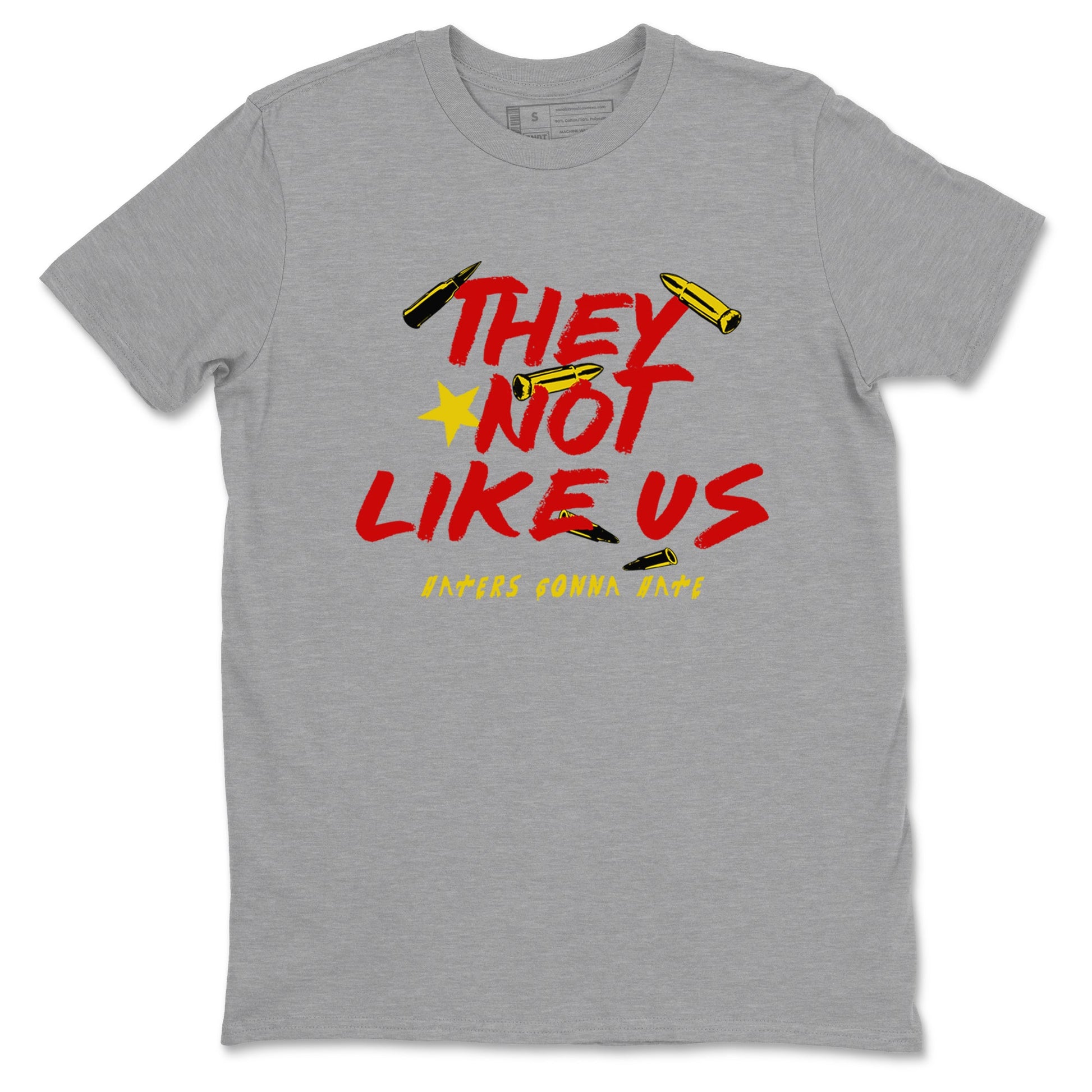 They Not Like Us sneaker match t-shirt styled to complete your fit with the Air Jordan 14 Challenge Red sneakers, AJ14 Ferrari, shown in Heather Grey 2.