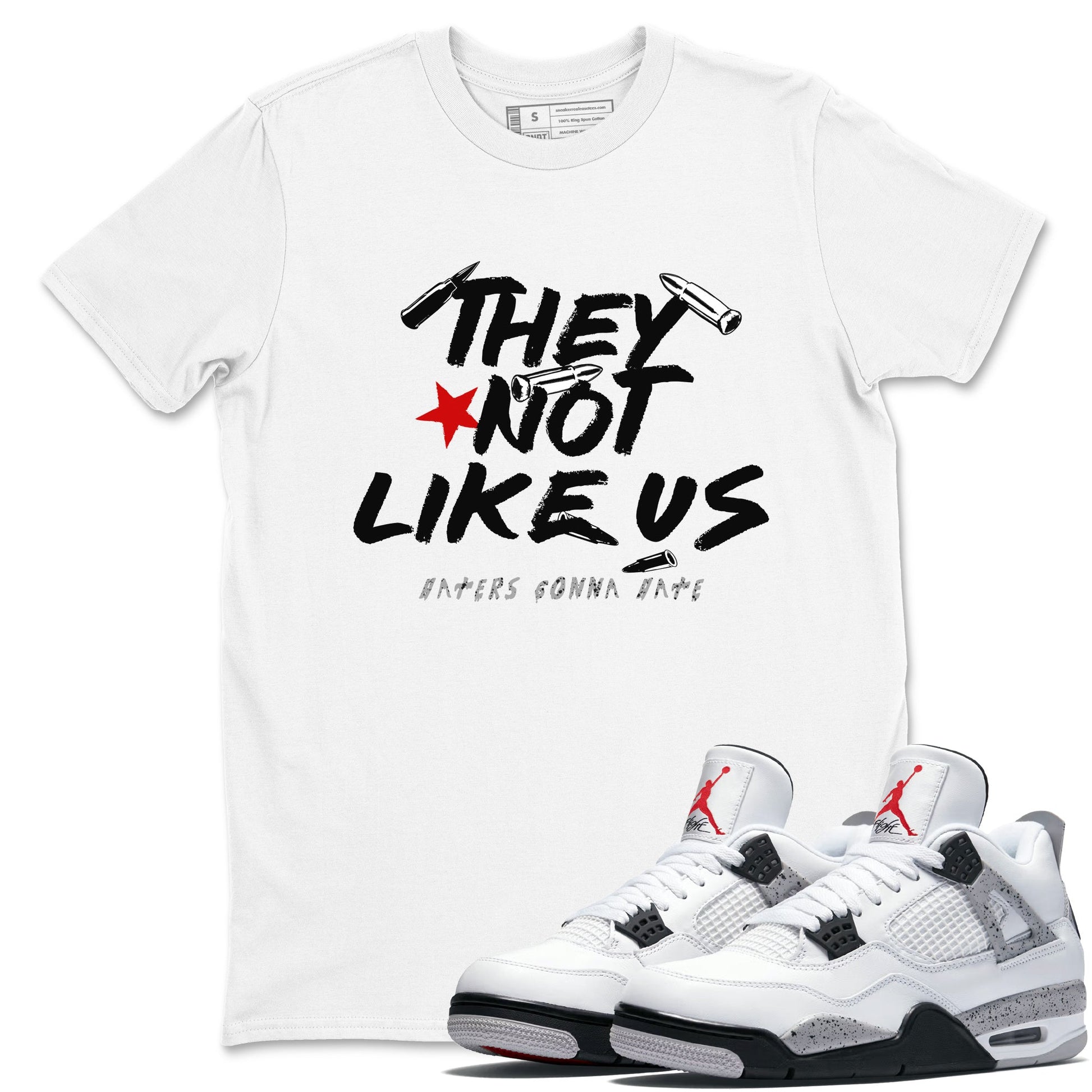They Not Like Us sneaker match t-shirt styled to complete your fit with the Air Jordan 4 White Cement sneakers, shown in White 1.