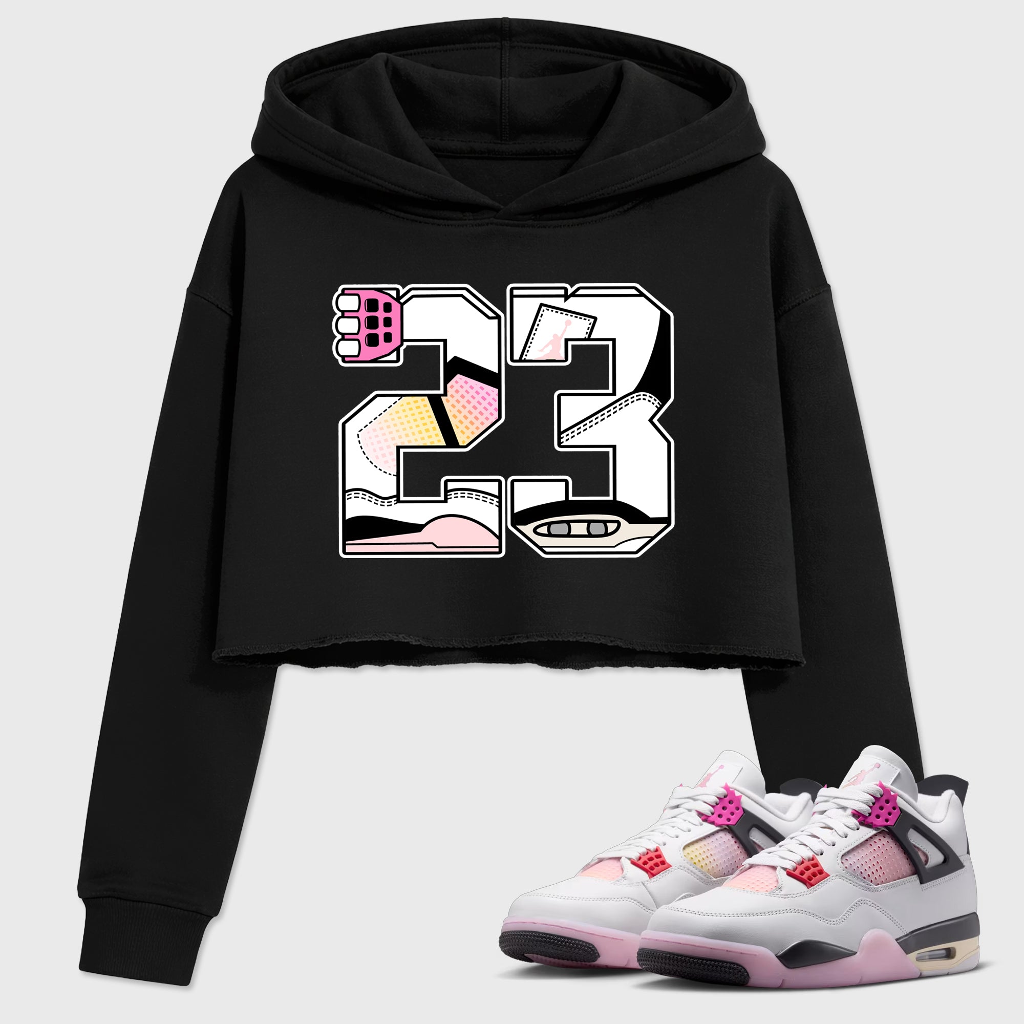 23 Women’s Graphic Crop Tee featuring original streetwear artwork designed to match the Air Jordan 4 Comic. Black 1 Crop Tee.