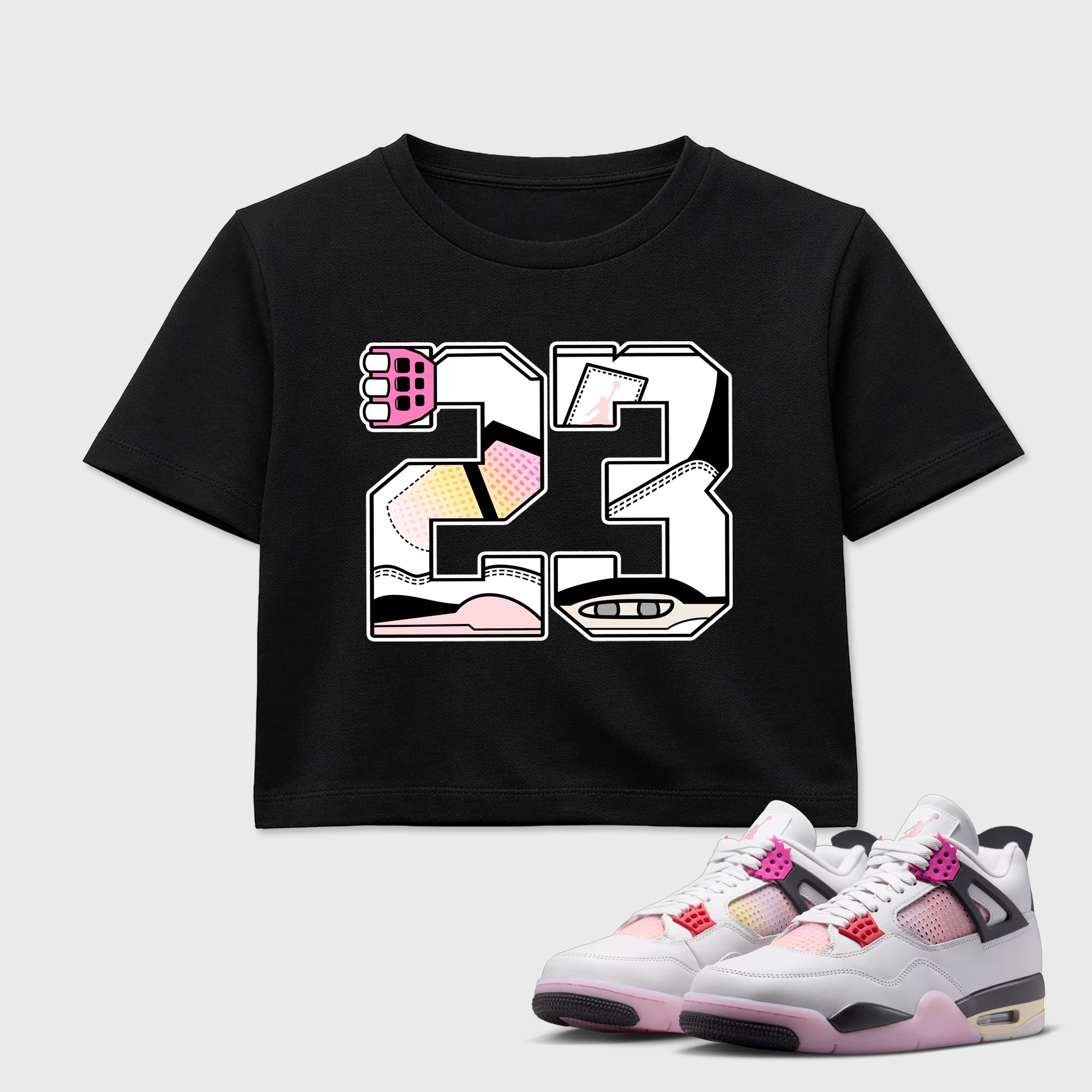 23 women’s crop tee designed to match the Air Jordan 4 Comic, featuring coordinated Black 1 options for a perfect streetwear vibe.