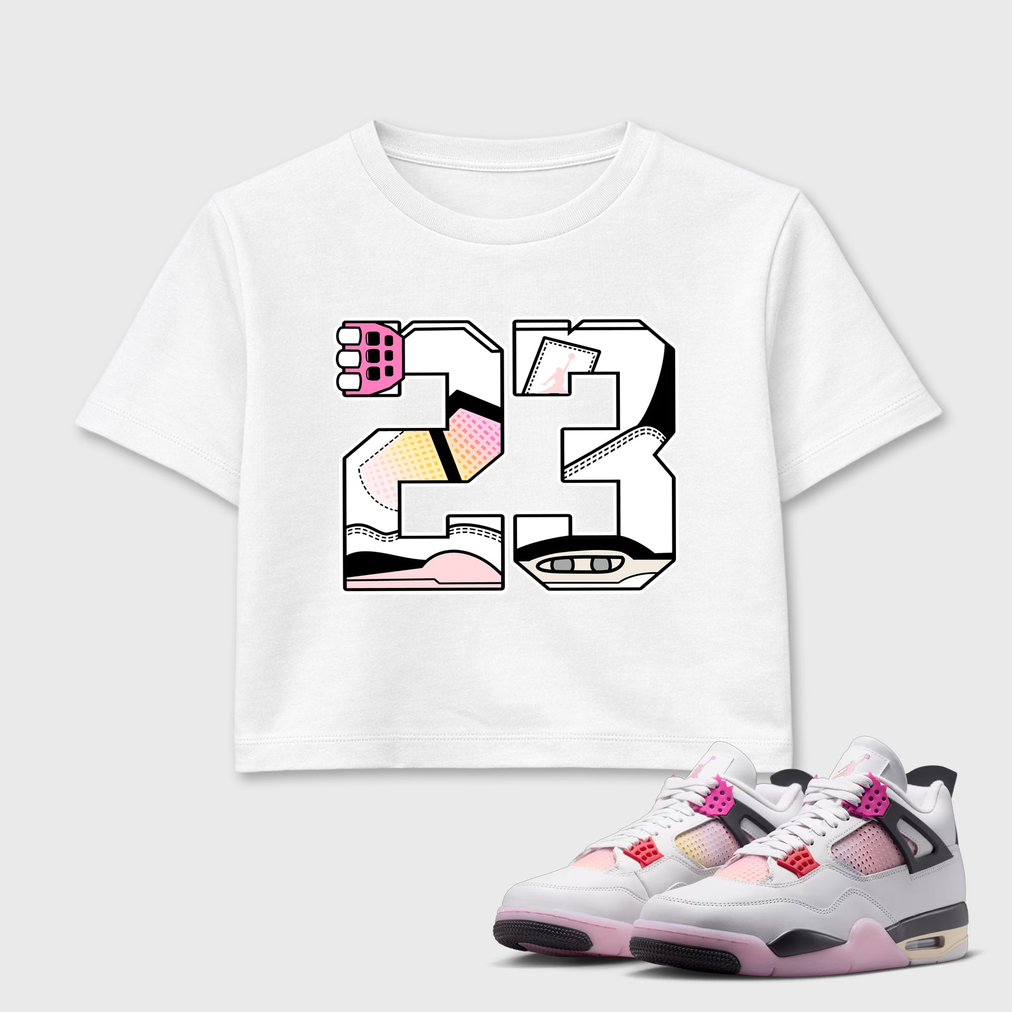 23 women’s crop tee designed to match the Air Jordan 4 Comic, featuring coordinated White 1 options for a perfect streetwear vibe.