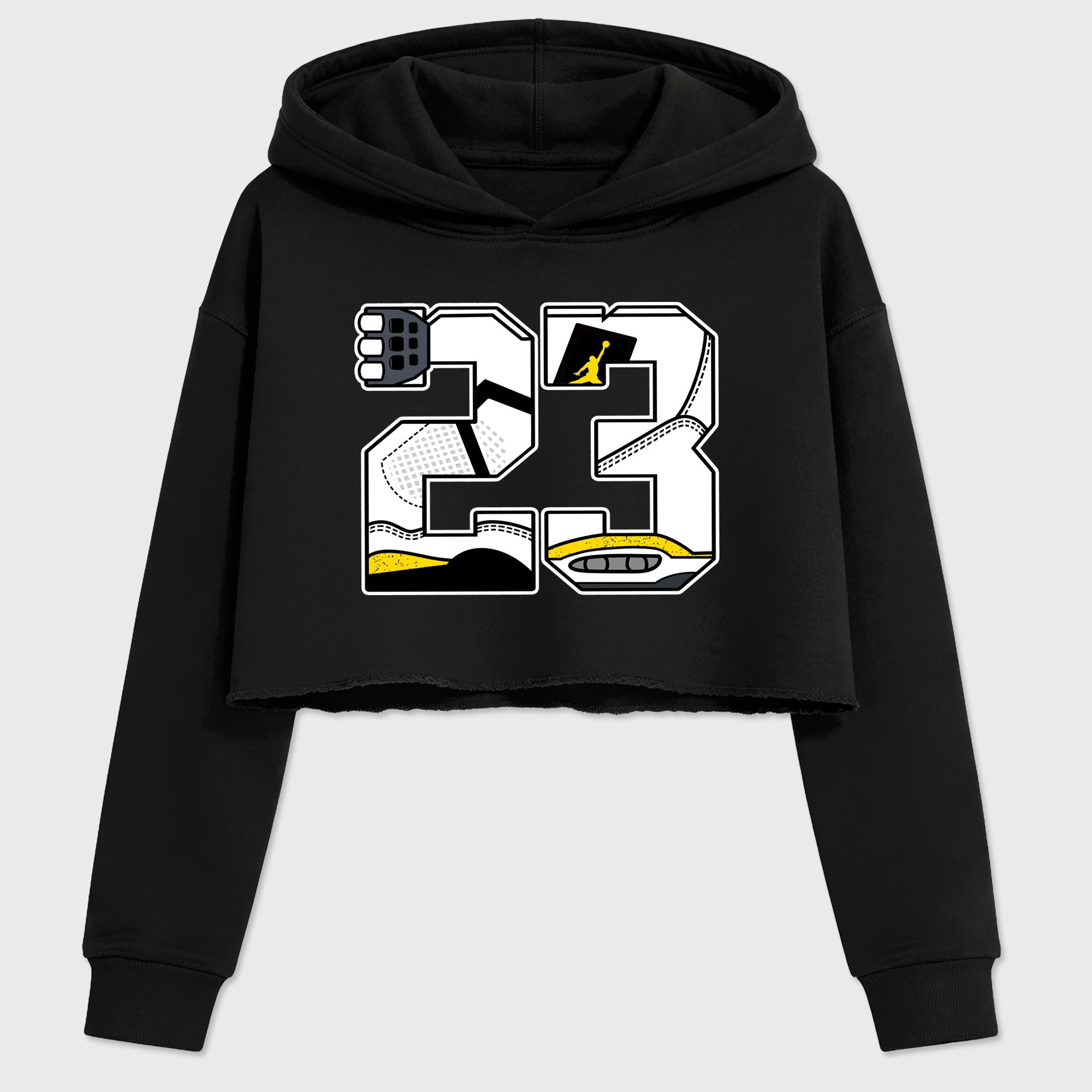 23 Women’s Graphic Crop Tee featuring original streetwear artwork designed to match the Air Jordan 4 Tour Yellow. Black 2 Crop Tee.