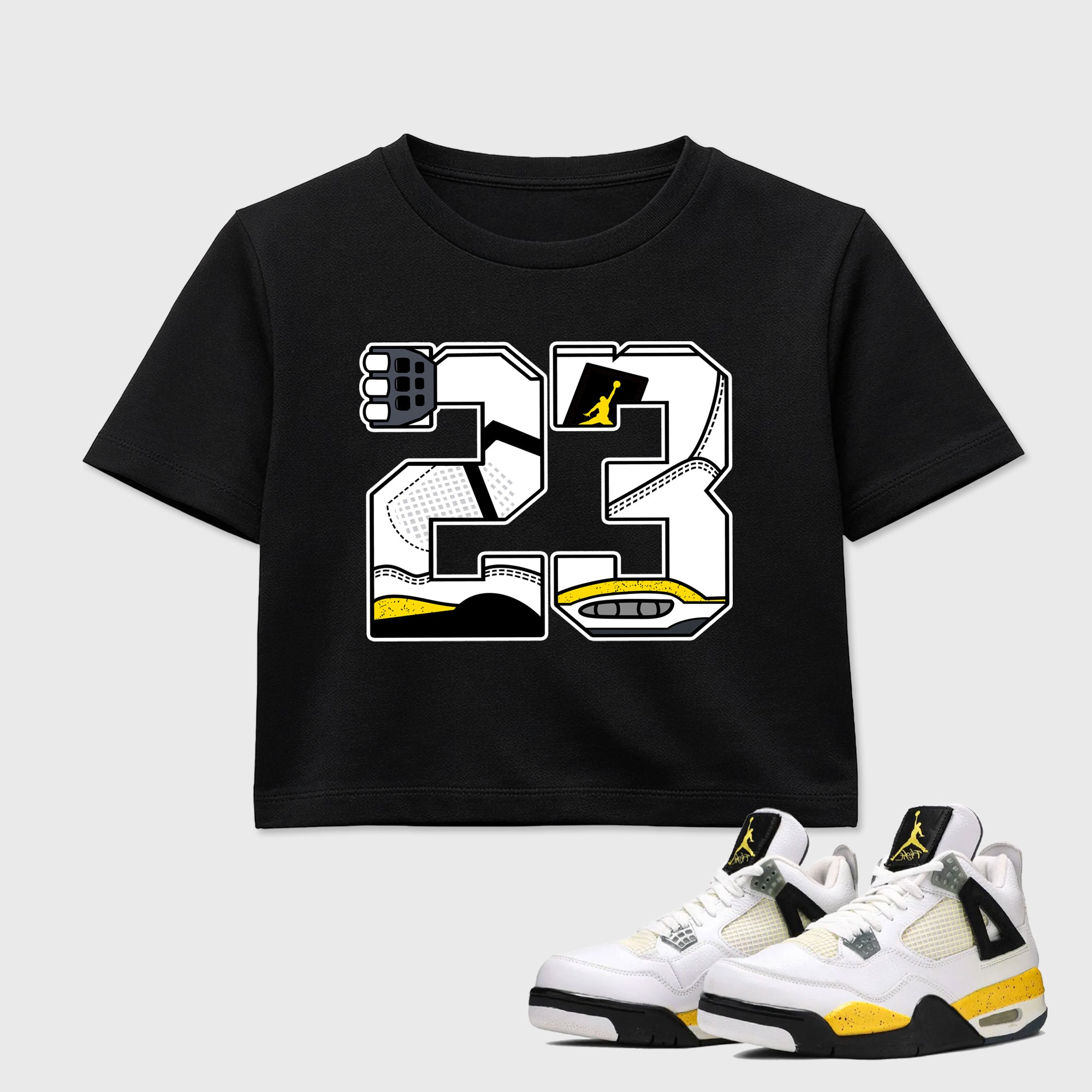 23 women’s crop tee designed to match the Air Jordan 4 Tour Yellow, featuring coordinated Black 1 options for a perfect streetwear vibe.