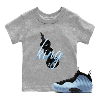 3D King baby and kids t-shirt crafted for little sneakerheads to shine with the Air Foamposite One Psychic Blue sneakers, displayed in Heather Grey 1.