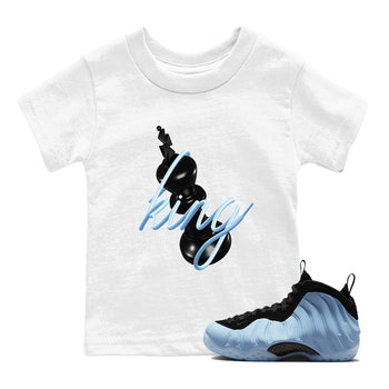 3D King baby and kids t-shirt crafted for little sneakerheads to shine with the Air Foamposite One Psychic Blue sneakers, displayed in White 1.