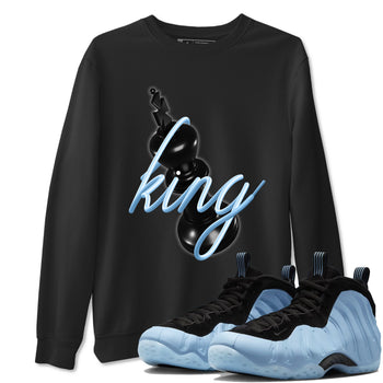 3D King sneaker match t-shirt styled to complete your fit with the Air Foamposite One Psychic Blue sneakers, shown in Black 1.