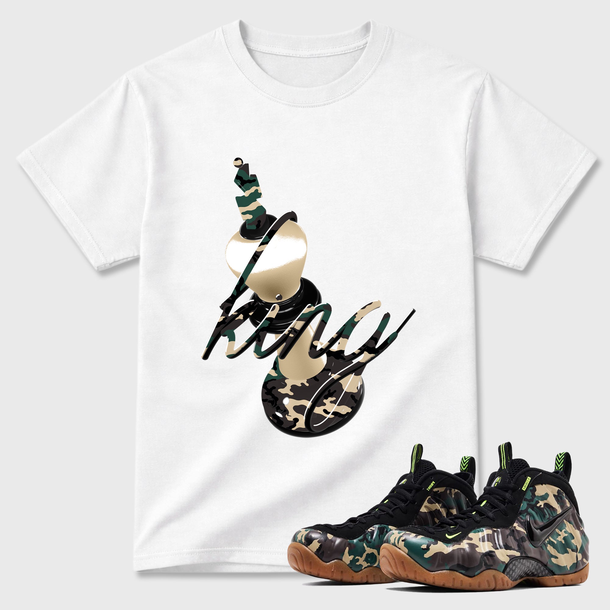 3D King Graphic T-Shirt featuring original streetwear artwork designed to match the Air Foamposite Pro Green Camo. White 1 Graphic T-Shirt.