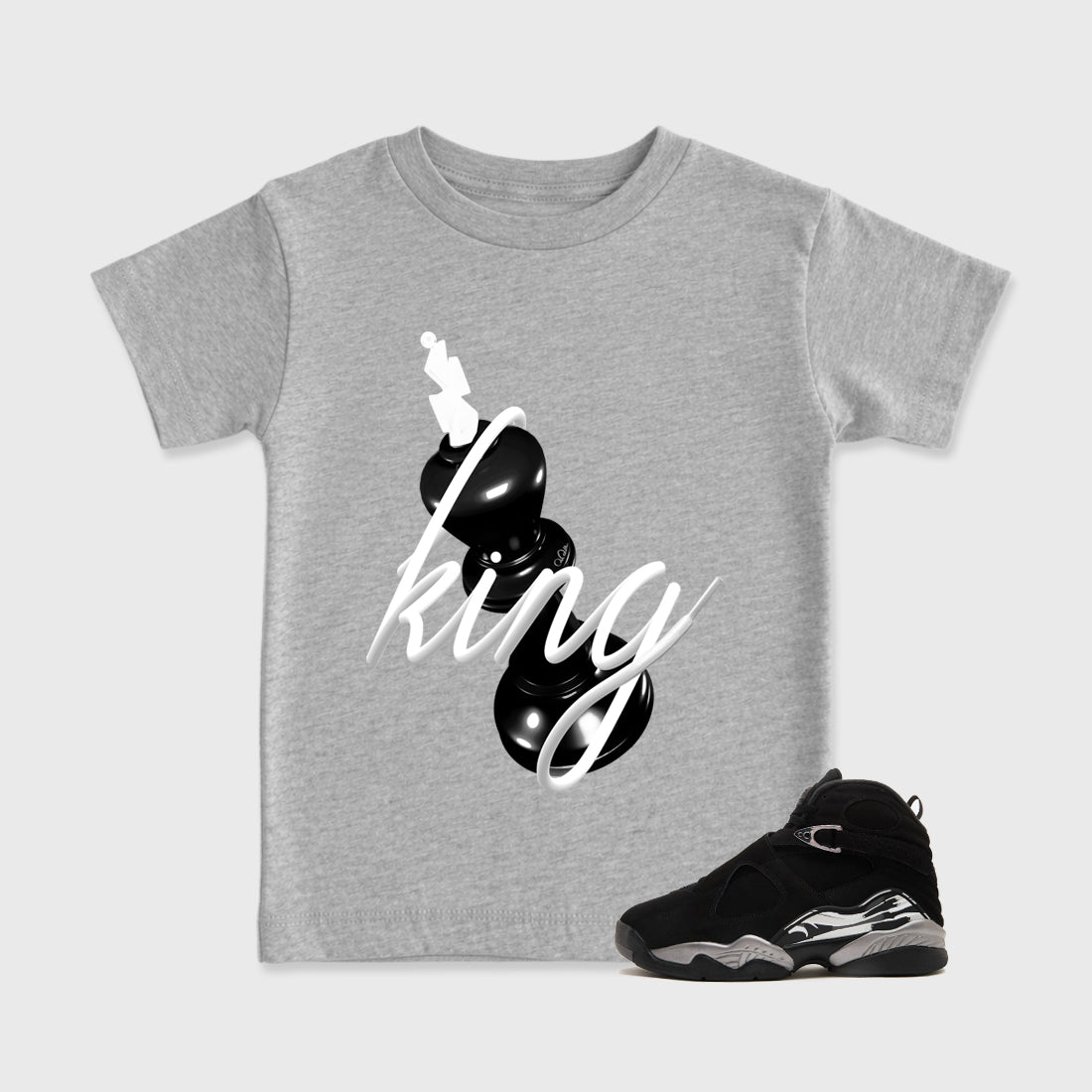 3D King Baby & Kids Graphic T-Shirt featuring original artwork designed to match the Air Jordan 8 Chrome. Heather Grey 1 Kids Graphic Tee.