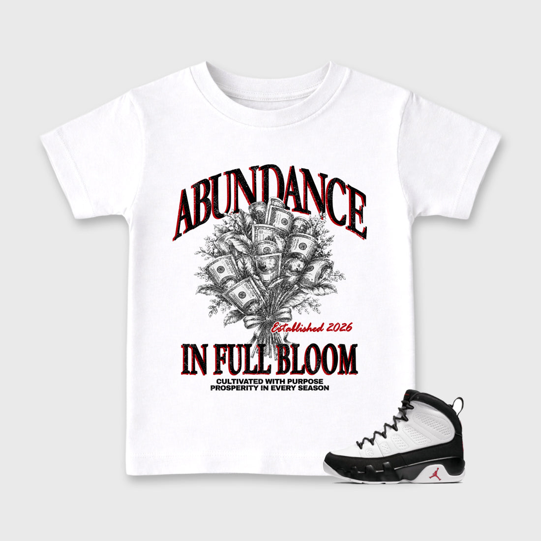 Abundance Baby & Kids Graphic T-Shirt featuring original artwork designed to match the Air Jordan 9 True Red. White 1 Kids Graphic Tee.