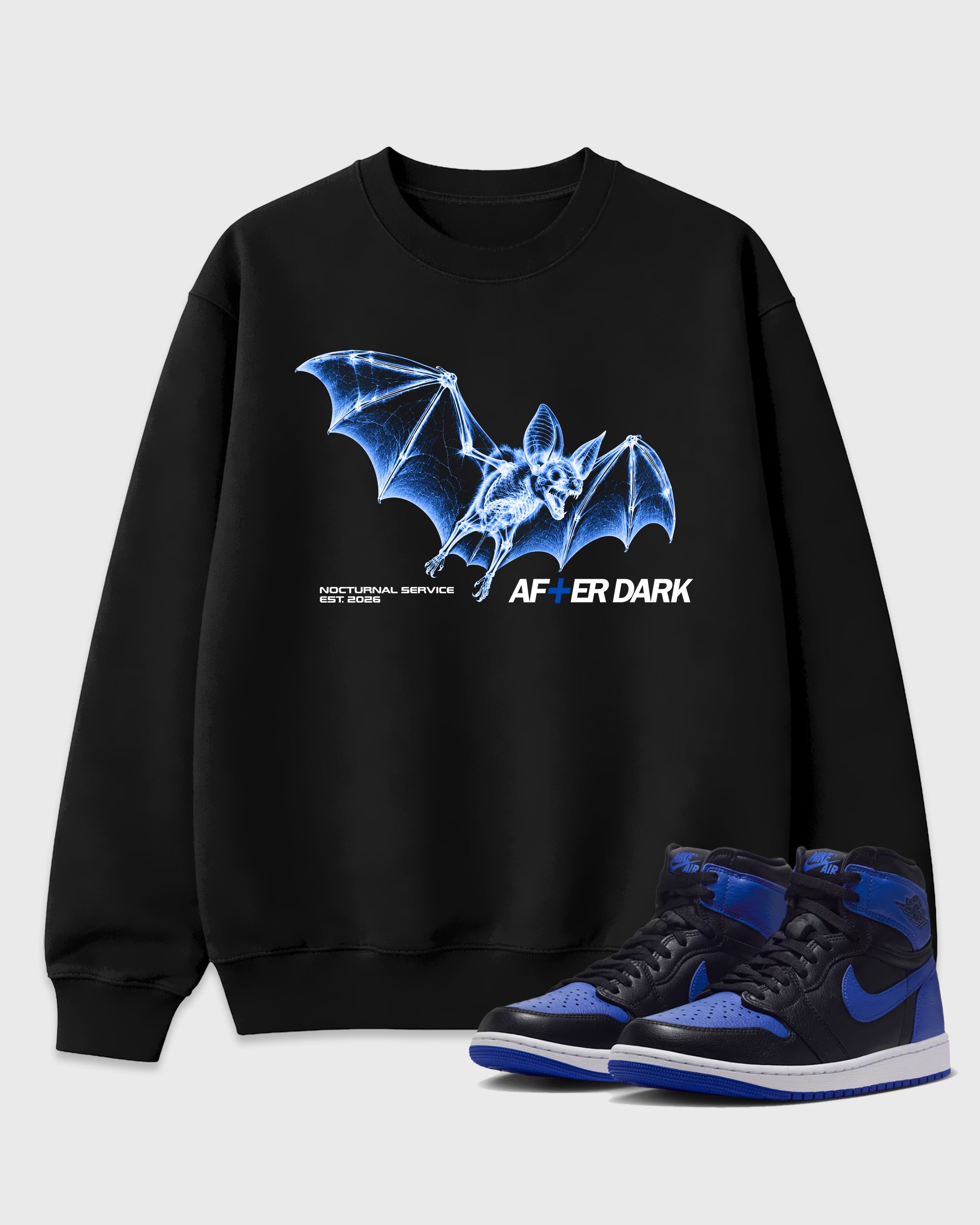 After Dark Graphic T-Shirt featuring original streetwear artwork designed to match the Air Jordan 1 Royal. Black 1 Graphic Tee.