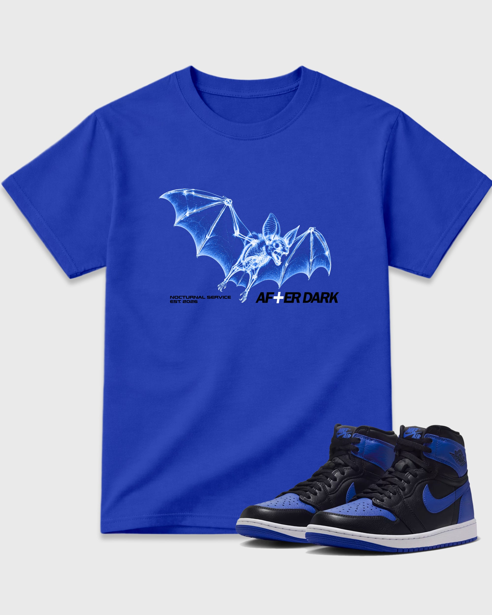 After Dark Graphic T-Shirt featuring original streetwear artwork designed to match the Air Jordan 1 Royal. Royal Blue 1 Graphic T-Shirt.