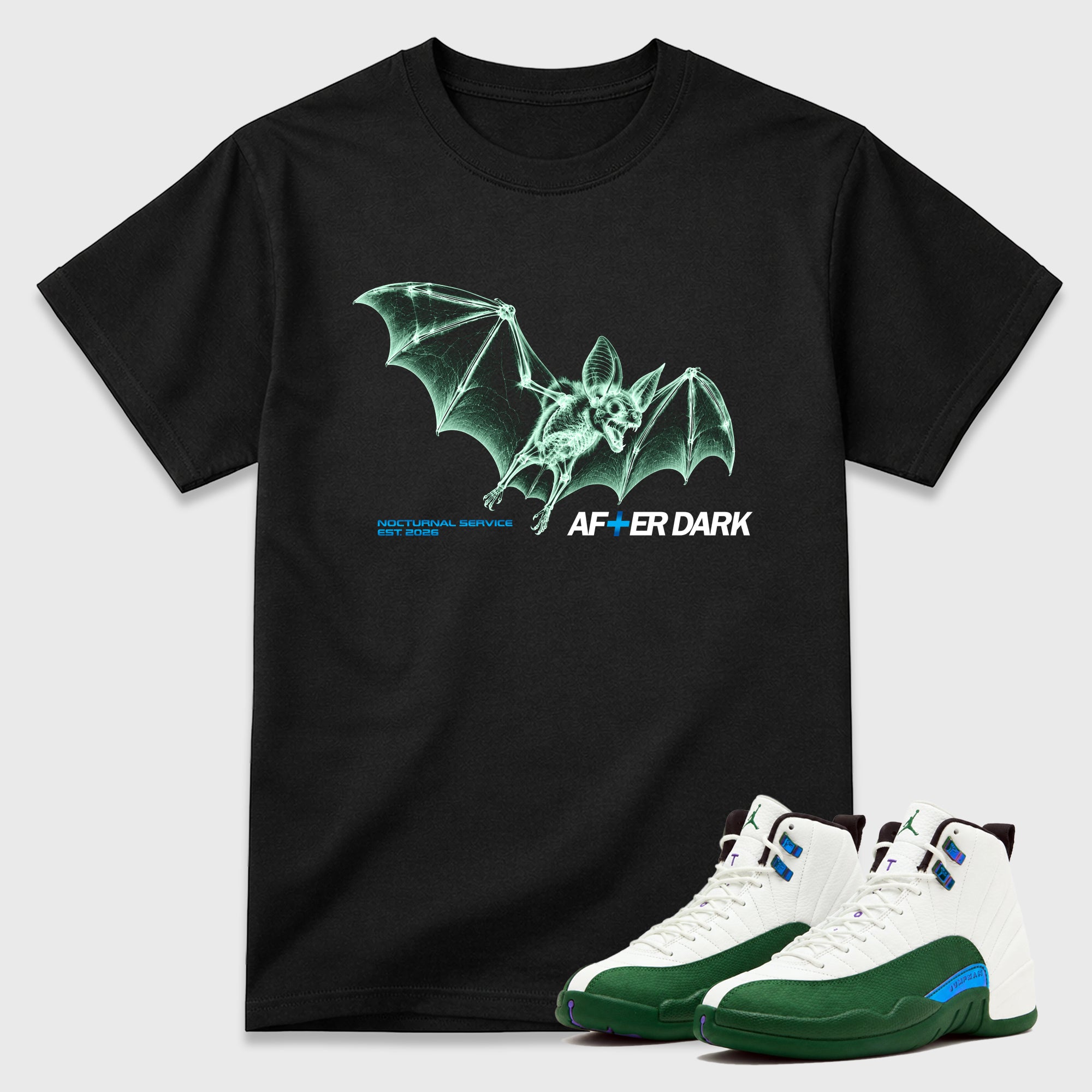 After Dark Graphic T-Shirt featuring original streetwear artwork designed to match the Air Jordan 12 Summit Green. Black 1 Graphic T-Shirt.
