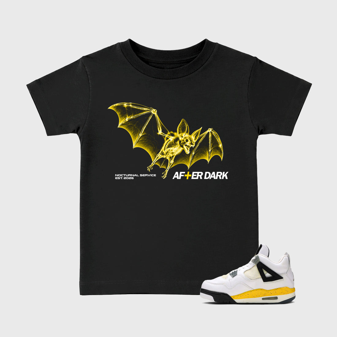 After Dark Baby & Kids Graphic T-Shirt featuring original artwork designed to match the Air Jordan 4 Tour Yellow. Black 1 Kids Graphic Tee.