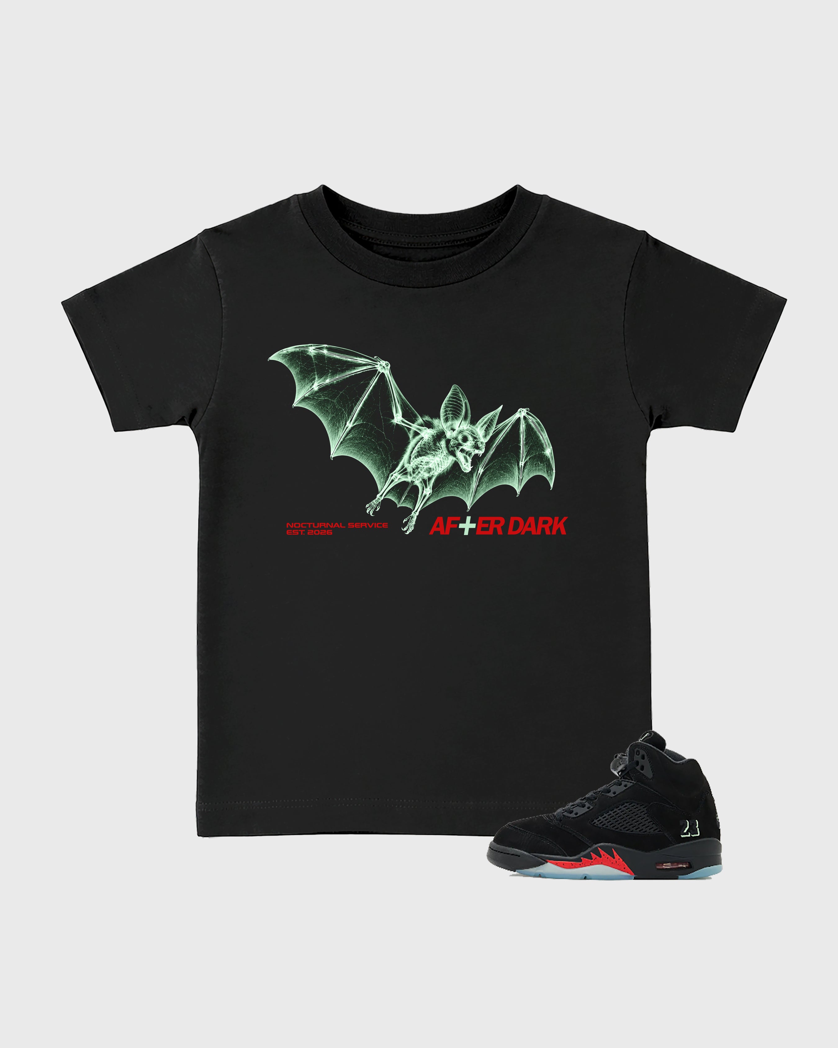 After Dark Baby & Kids Graphic T-Shirt featuring original artwork designed to match the Air Jordan 5 Halloween. Black 1 Kids Graphic Tee.