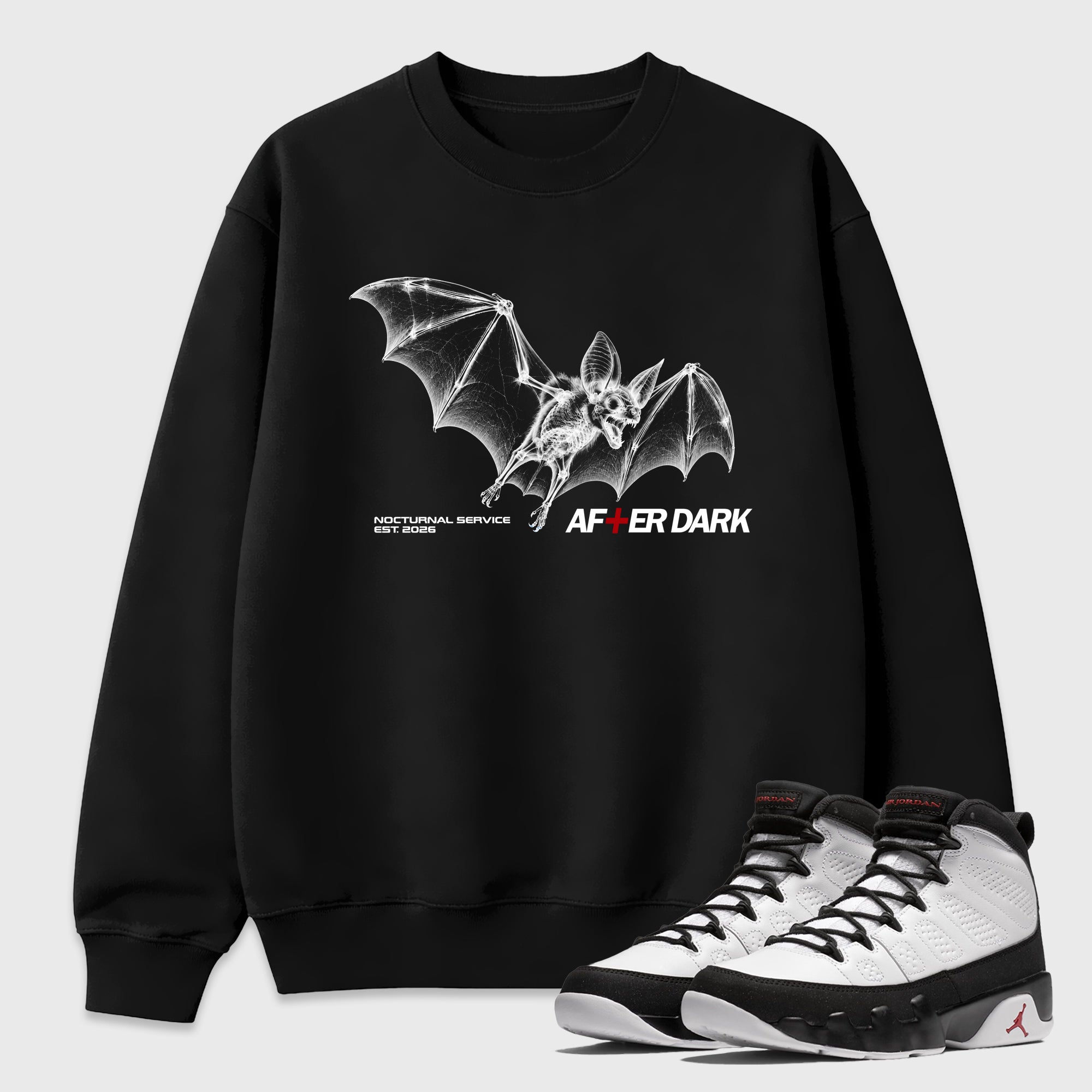 After Dark Graphic T-Shirt featuring original streetwear artwork designed to match the Air Jordan 9 True Red. Black 1 Graphic Tee.