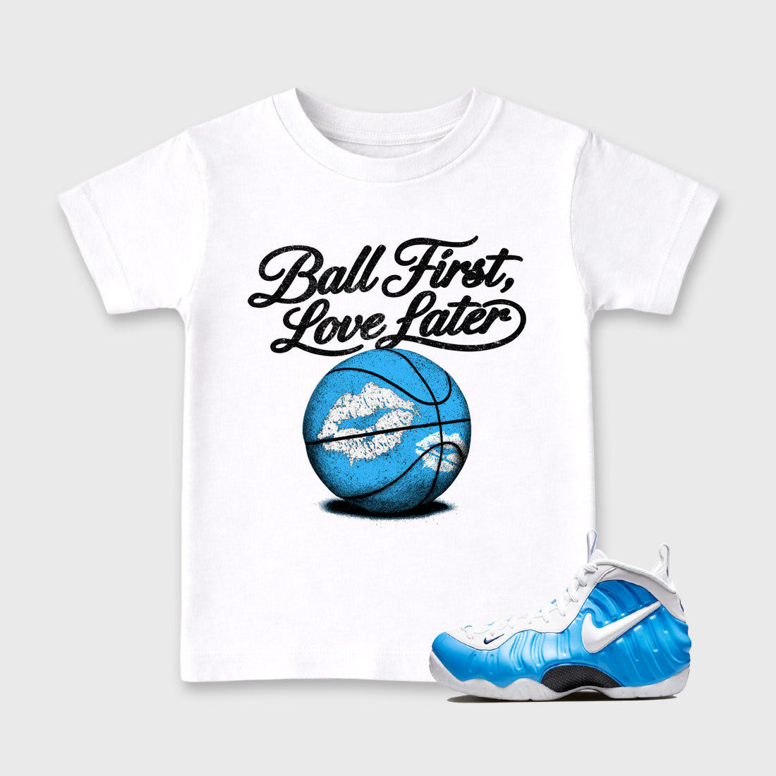 Best Sneakerfit Graphic Tee. Graphic Outfits. Sneaker Tees To Match Air Foamposite Pro University Blue Sneakers – Ball First Kiss Later Kids T-Shirt White 1