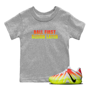 Sneaker Threads – Sneaker Tees To Match Nike JA 3 Under The Christmas Tree – Ball First Sleigh Later Youth Graphic Tee Heather Grey 1. Perfect for Jordan releases 2025 colorways. Perfect for Ja Morant sneaker releases and Christmas 2025 colorways.