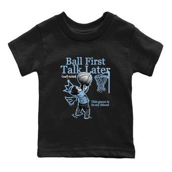 Ball First Talk Later baby and kids t-shirt crafted for little sneakerheads to shine with the Air Foamposite One Psychic Blue sneakers, displayed in Black 2.