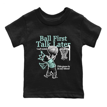 Ball First Talk Later baby and kids t-shirt crafted for little sneakerheads to shine with the Air Jordan 11 Igloo sneakers, displayed in Black 2.