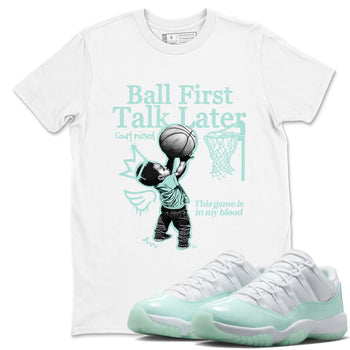 Ball First Talk Later sneaker match t-shirt styled to complete your fit with the Air Jordan 11 Igloo sneakers, shown in White 1.