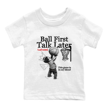 Ball First Talk Later baby and kids t-shirt crafted for little sneakerheads to shine with the Air Jordan 4 White Cement sneakers, displayed in White 2.