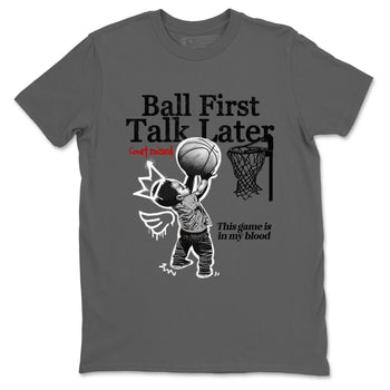 Ball First Talk Later sneaker match t-shirt styled to complete your fit with the Air Jordan 4 White Cement sneakers, shown in Cool Grey 2.