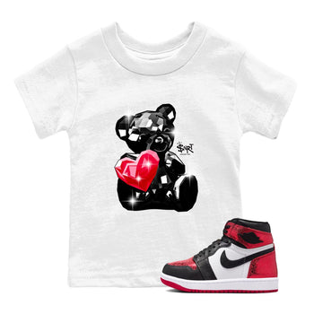 Bear Germs baby and kids t-shirt crafted for little sneakerheads to shine with the Air Jordan 1 Ruby sneakers, displayed in White 1.