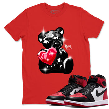 Bear Germs sneaker match t-shirt styled to complete your fit with the Air Jordan 1 Ruby sneakers, shown in Red 1.