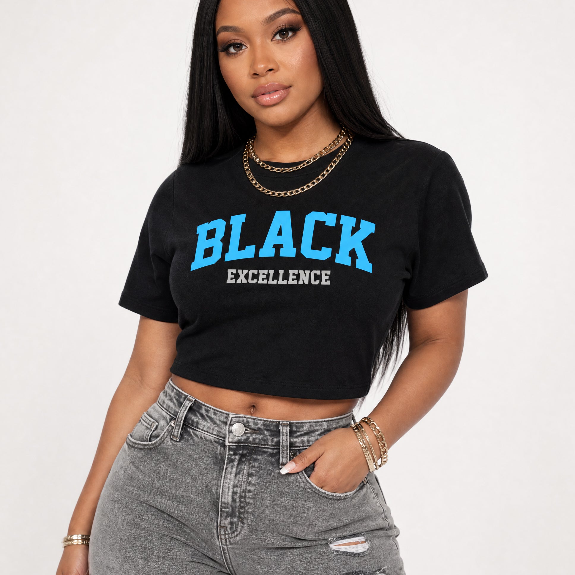 Person wearing a black t-shirt with 'BLACK EXCELLENCE' text on a plain background
