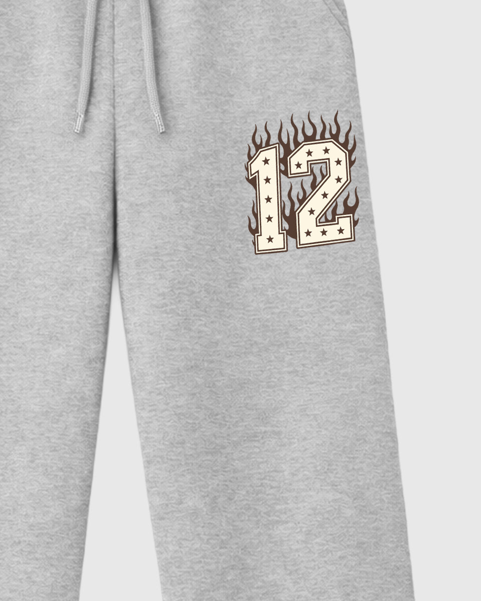 Blaze Varsity graphic wide cut sweatpants designed to match the Air Jordan 12 Fireside, featuring coordinated Heather Grey 2 options for a perfect streetwear vibe.