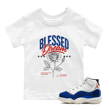 White t-shirt with 'Blessed Dream' design and a matching sneaker on a white background