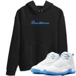 Born Different sneaker match t-shirt styled to complete your fit with the Air Jordan 12 White and University Blue sneakers, shown in Black 1.