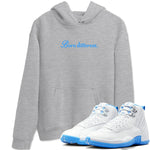 Born Different sneaker match t-shirt styled to complete your fit with the Air Jordan 12 White and University Blue sneakers, shown in Heather Grey 1.