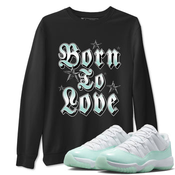 Born To Love sneaker match t-shirt styled to complete your fit with the Air Jordan 11 Igloo sneakers, shown in Black 1.