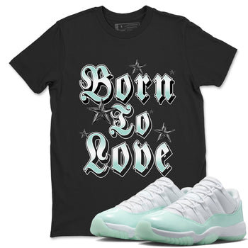 Born To Love sneaker match t-shirt styled to complete your fit with the Air Jordan 11 Igloo sneakers, shown in Black 1.