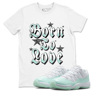 Born To Love sneaker match t-shirt styled to complete your fit with the Air Jordan 11 Igloo sneakers, shown in White 1.