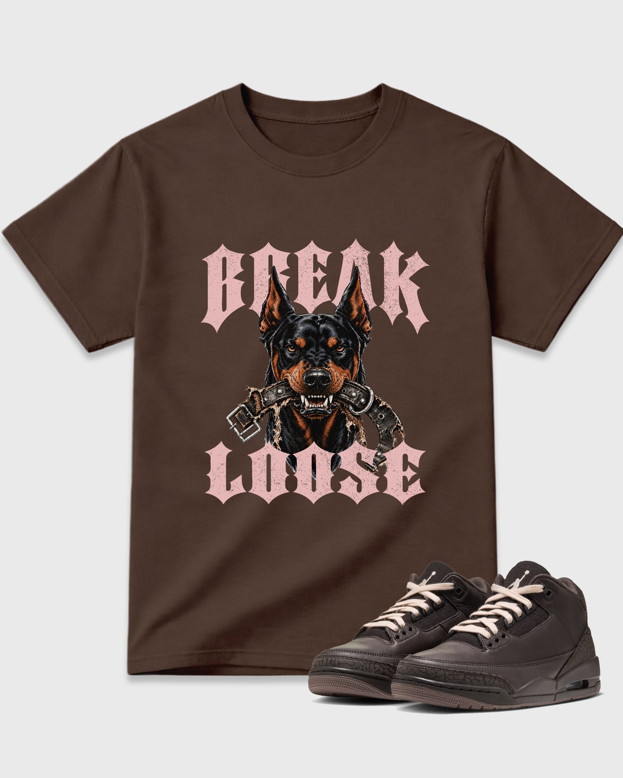 Break Loose Graphic T-Shirt featuring original streetwear artwork designed to match the Air Jordan 3 Fireside. Dark Chocolate 1 Graphic T-Shirt.