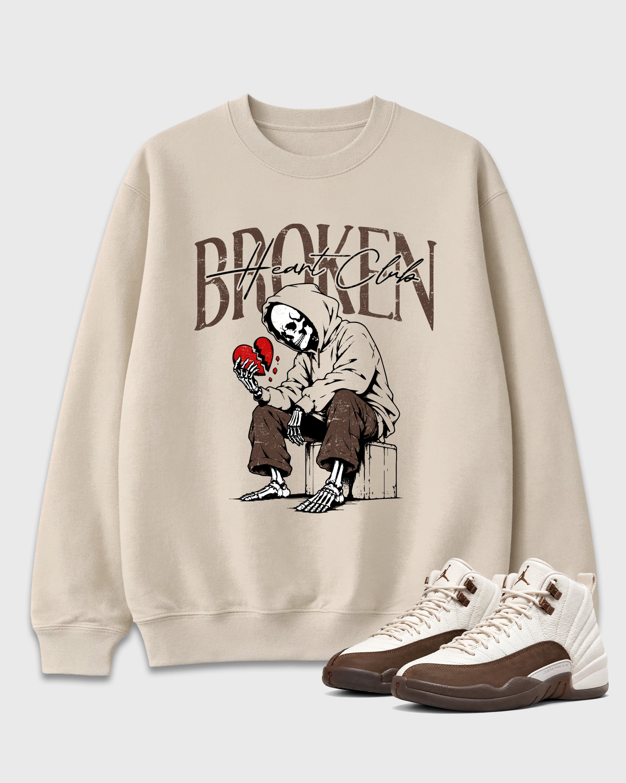 Broken Heart Club Graphic T-Shirt featuring original streetwear artwork designed to match the Air Jordan 12 Fireside. Natural 1 Graphic Tee.