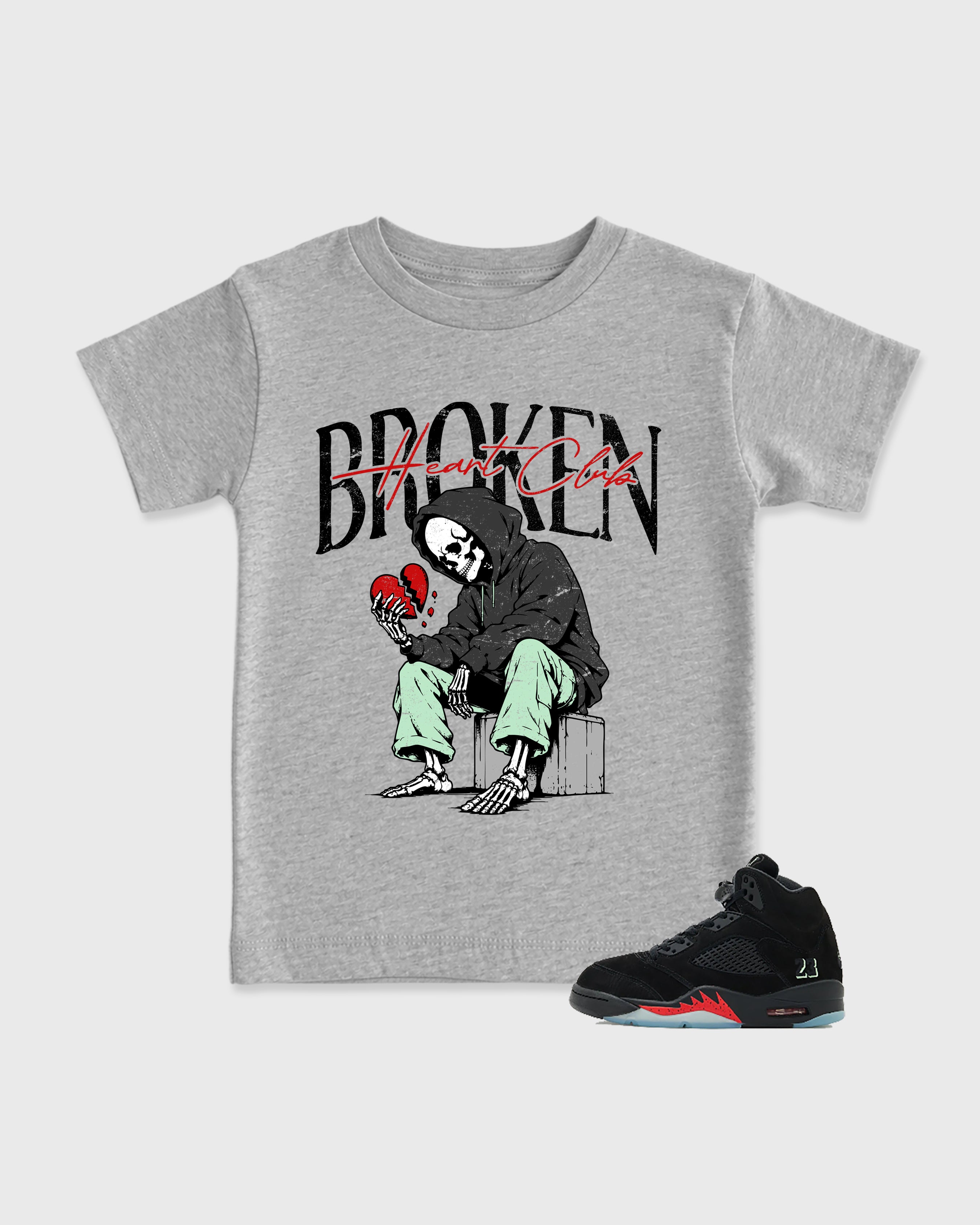 Broken Heart Club Baby & Kids Graphic T-Shirt featuring original artwork designed to match the Air Jordan 5 Halloween. Heather Grey 1 Kids Graphic Tee.
