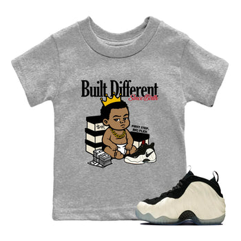 Sneaker Threads – Sneaker Tees To Match Air Foamposite One Pearl – Built Different Since Birth Youth Graphic Tee Heather Grey 1. Perfect for Jordan releases 2025 colorways.