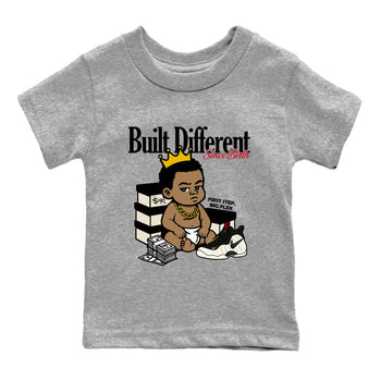 Sneaker Threads – Sneaker Tees To Match Air Foamposite One Pearl – Built Different Since Birth Youth Graphic Tee Heather Grey 2. Perfect for Jordan releases 2025 colorways.