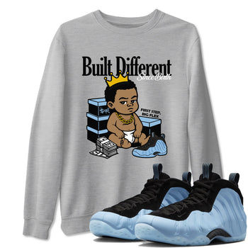 Built Different Since Birth sneaker match t-shirt styled to complete your fit with the Air Foamposite One Psychic Blue sneakers, shown in Heather Grey 1.