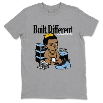 Built Different Since Birth sneaker match t-shirt styled to complete your fit with the Air Foamposite One Psychic Blue sneakers, shown in Heather Grey 2.